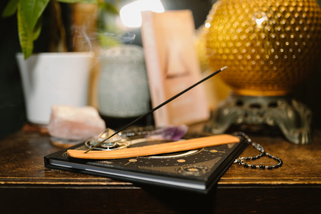 A book and some stones on a table